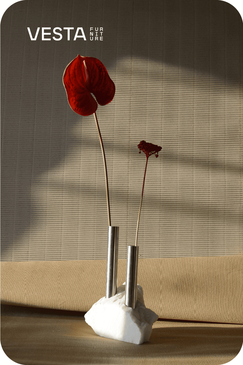 Showroom exposition of METEORITI C: Stem onyx and stainless steel vase By VESTA FURNITURE